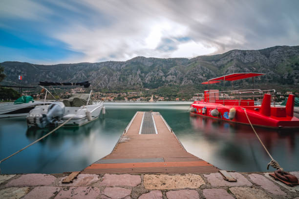Moored boats in the small marina in Kotor Bay harbour, Montenegro