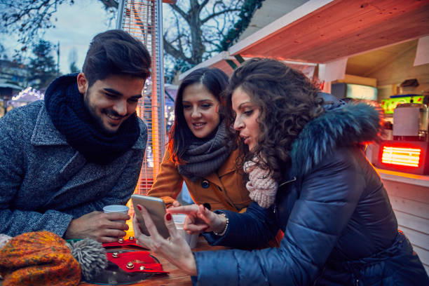 istock Friends On Christmas Market 1035970874