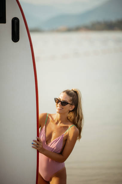 istock Surfers at the beach 1035971478