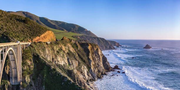istock Bixby Bridge overlooking cliff and Pacific Ocean 1035974946