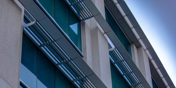 istock Modern building with glass windows at twilight 1035975082