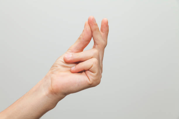 istock Male hand showing ''snap'' gesture, snapping or clicking with two fingers 1035977756