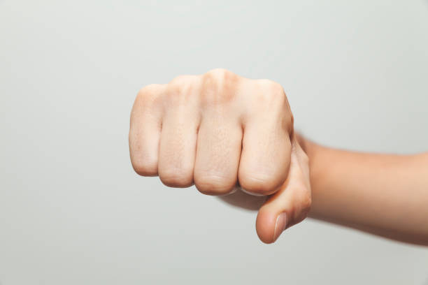 istock Male right fist, ready to punch 1035978482