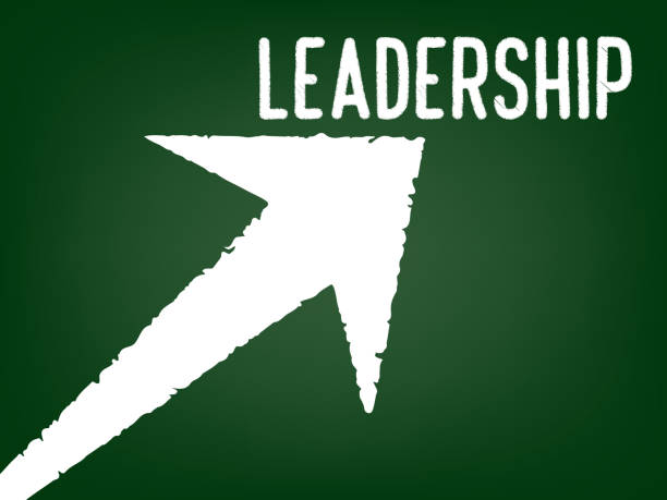 istock Leadership concept - Arrow with a text on chalk board 1035982580