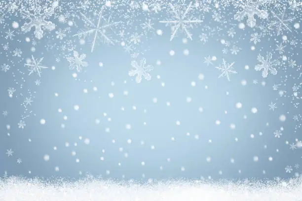 Photo of Winter holiday snow background with snowflakes for design