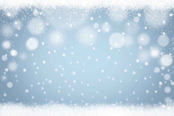 istock Winter snowflakes light blue bokeh background. Abstract Christmas holiday snow backdrop 1035985266