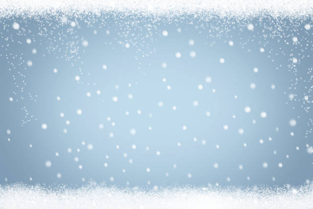 istock Winter background with falling snowflakes and snow 1035985286