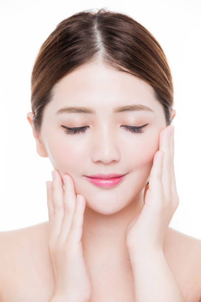 istock beauty woman touch face 1035991622
