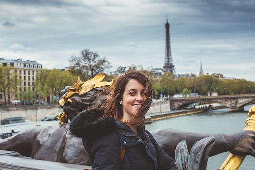 Young woman enjoying Paris