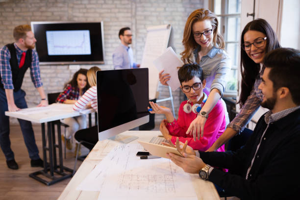 istock Picture of young architects discussing in office 1035995902