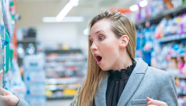 istock Astonished woman looking cheap products 1036003208