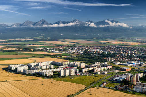 POPRAD, SLOVAKIA - JULY 28: Centre of city Poprad and High Tatras mountains from above on July 28, 2018 in Poprad