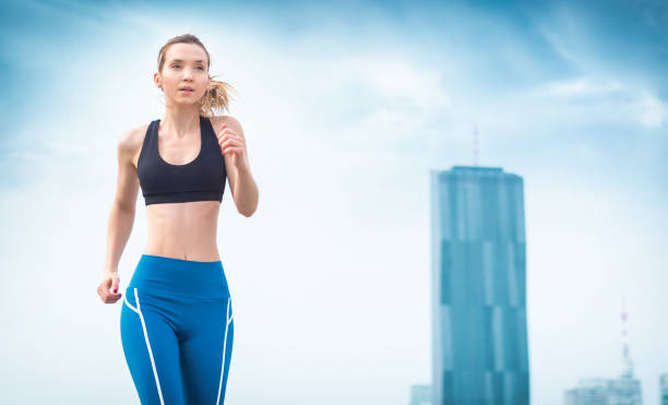 istock Athletic sport woman running and jogging 1036003492