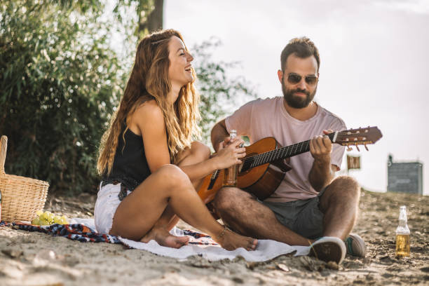 istock Couple enjoying on the beach 1036006344