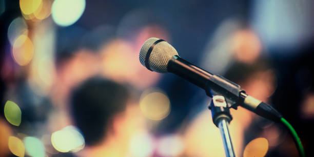 Microphone on stage Microphone on stage microphone stand photos stock pictures, royalty-free photos & images