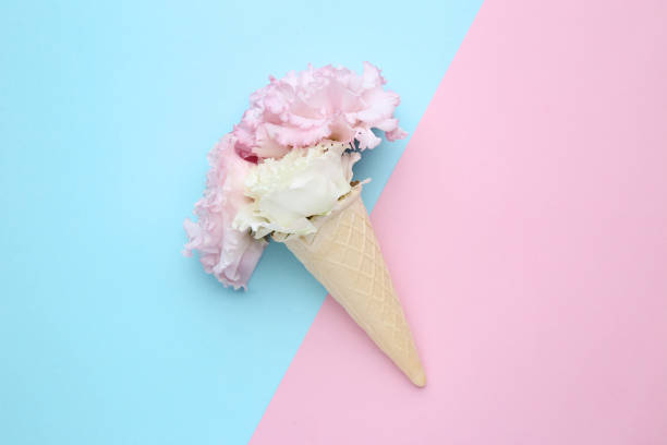 istock Eustoma flowers with wafer cone on colorful background 1036013970