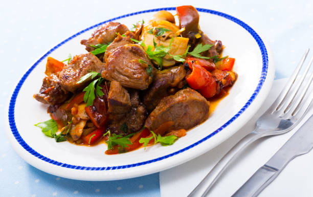 istock Stewed meat with vegetables and mushrooms 1036018312