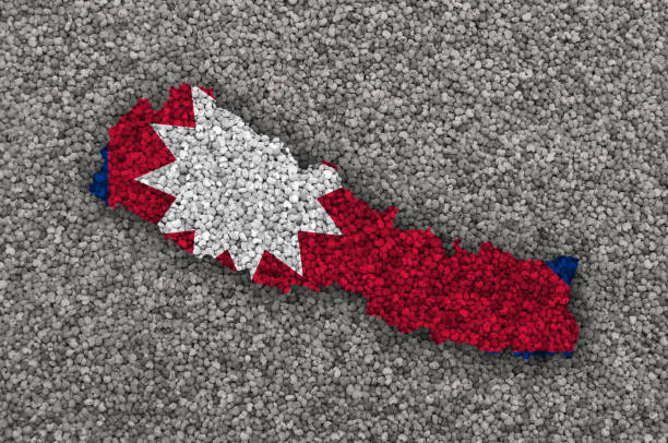 Map and flag of Nepal on poppy seeds
