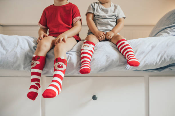 istock Brothers wearing christmas socks 1036020712