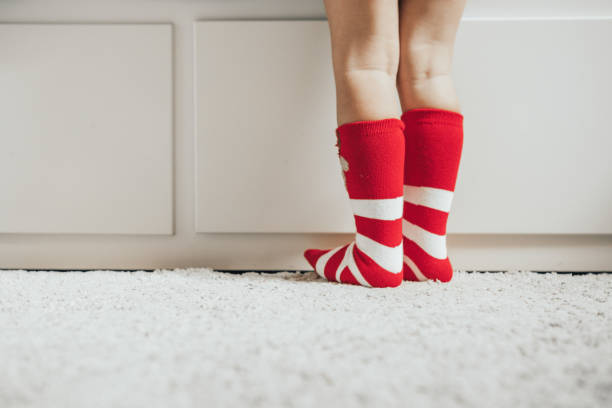 istock Brothers wearing christmas socks 1036022818