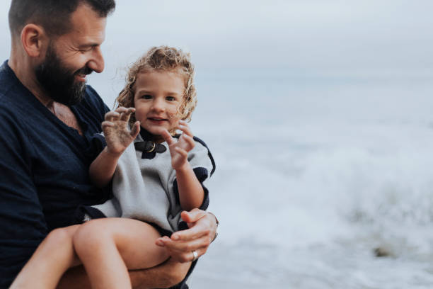 istock Dad carrying her playful daughter 1036030396