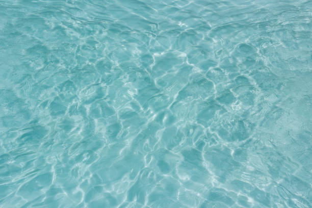 istock Shining light and reflections of blue water 1036036778