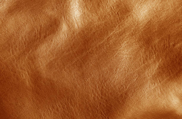 istock Natural leather on sun in orange tone 1036037458