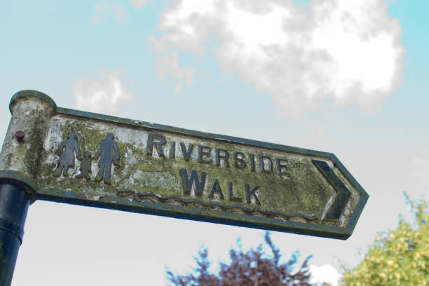 Riverside walk sign in Wyndham park in Grantham, Lincolnshire which has the River Witham running through it.