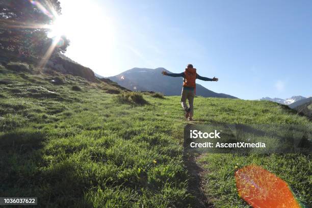 Man Walks Along Pathway In Celebratory Mood Stock Photo - Download Image Now - Andorra, Footpath, Hiking