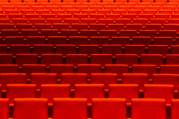 istock Empty oditorium with red cinema or theatre seats, chairs. 1036041630
