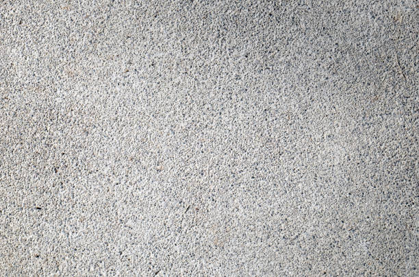 small gravel texture in the ground, pebble background stock photo