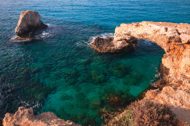 istock Love bridge. Natural stone arch, Cyprus 1036056596