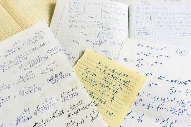 istock sheets of paper with mathematical and physical calculations 1036058182