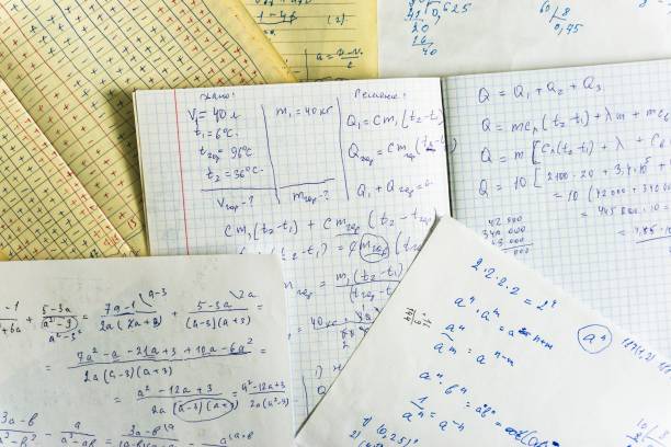istock sheets of paper with mathematical and physical calculations 1036058188