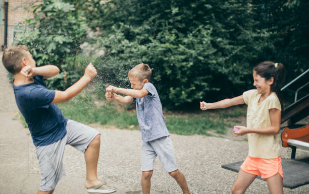 istock Preparing for water balloon battle 1036058378