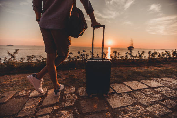 istock Enjoying in sunset by the sea 1036067572