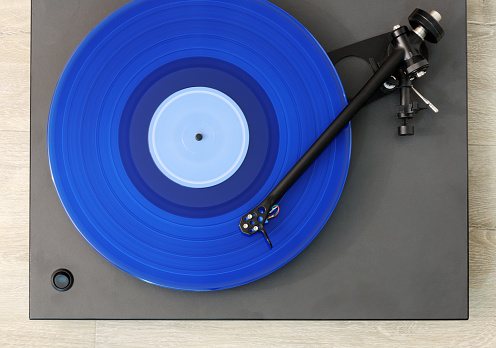 turntable playing blue record