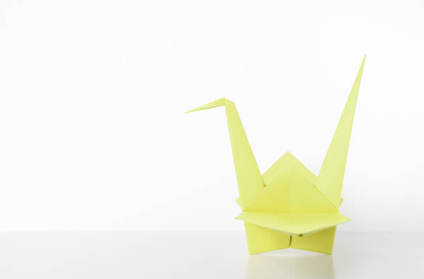 istock Yellow Lemon Origami Crane 1036076556