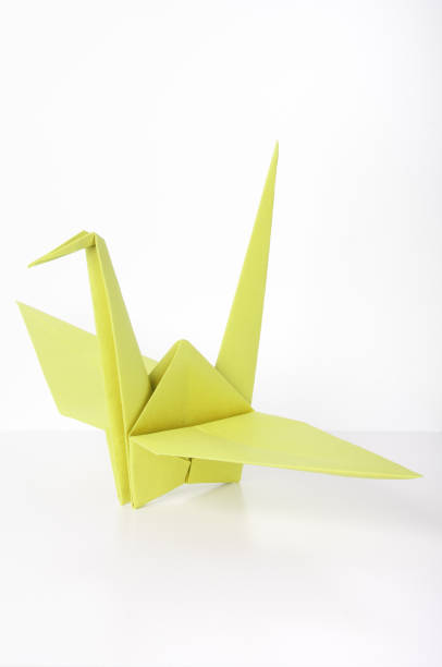 istock Yellow Lemon Origami Crane 1036079438