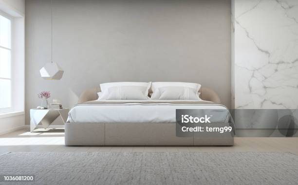 Bedroom Of Luxury House With Double Bed And Carpet On Wooden Floor Empty Gray Concrete Wall Background In Vacation Home Or Holiday Villa Stock Photo - Download Image Now