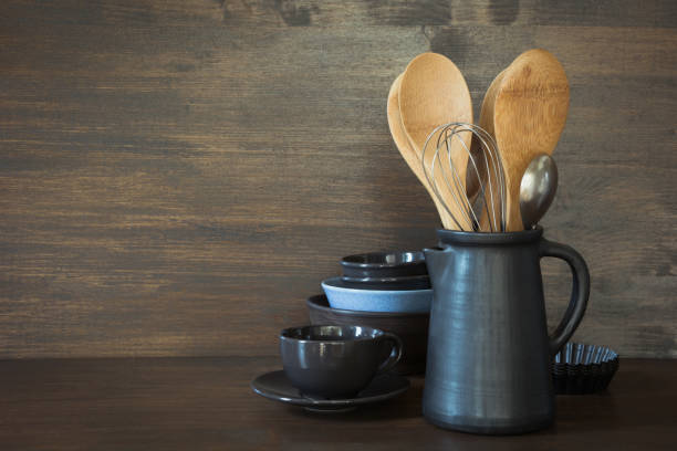 istock Crockery, clayware, dark utensils and other different stuff on wooden tabletop. Kitchen still life as background for design. Copy space. 1036082268