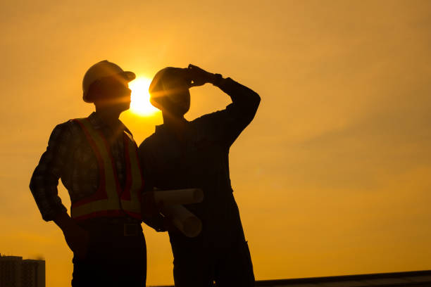 istock Silhouette of young engineers and confident working closely and successfully. 1036082434