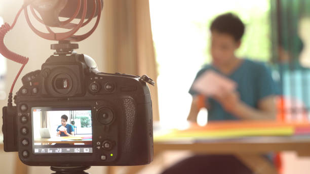istock Man recording video for DIY stuff preparation 1036098048