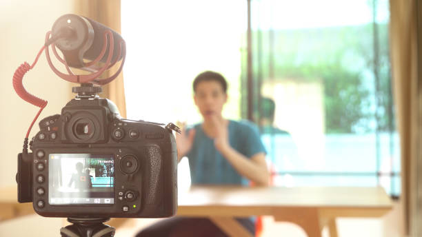 istock Man recording video for DIY stuff preparation 1036098066