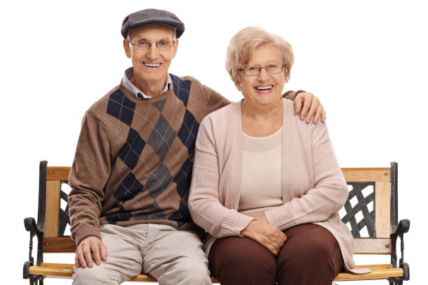istock Mature couple sitting on a bench 1036109710