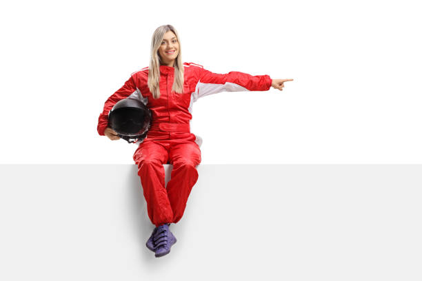 istock Female racer seated on a panel pointing 1036112346