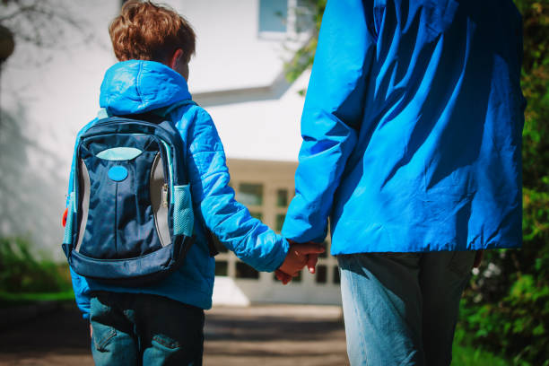 istock father and son go to school, education 1036126062