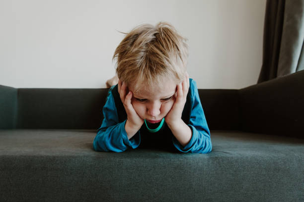 istock sad child, stress and depression, exhaustion mental issues 1036126084