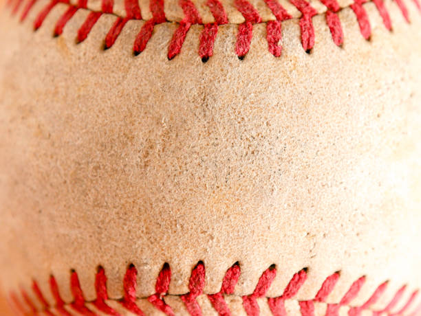 istock Sports Equipment old Baseball background texture 1036135978