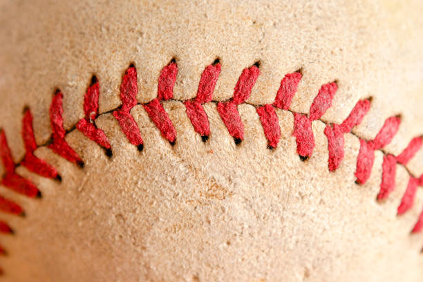 istock Sports Equipment old Baseball background texture 1036136128